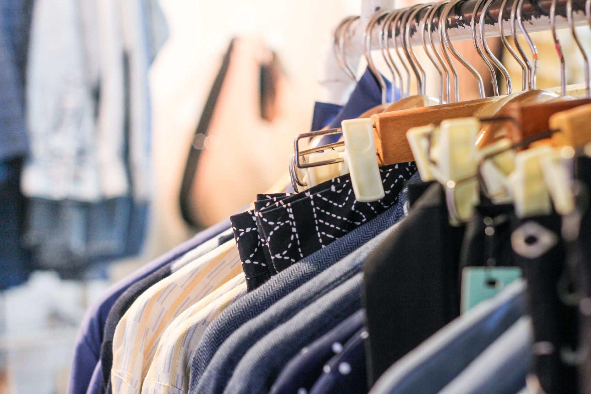 Fashion collection on hangers in boutique