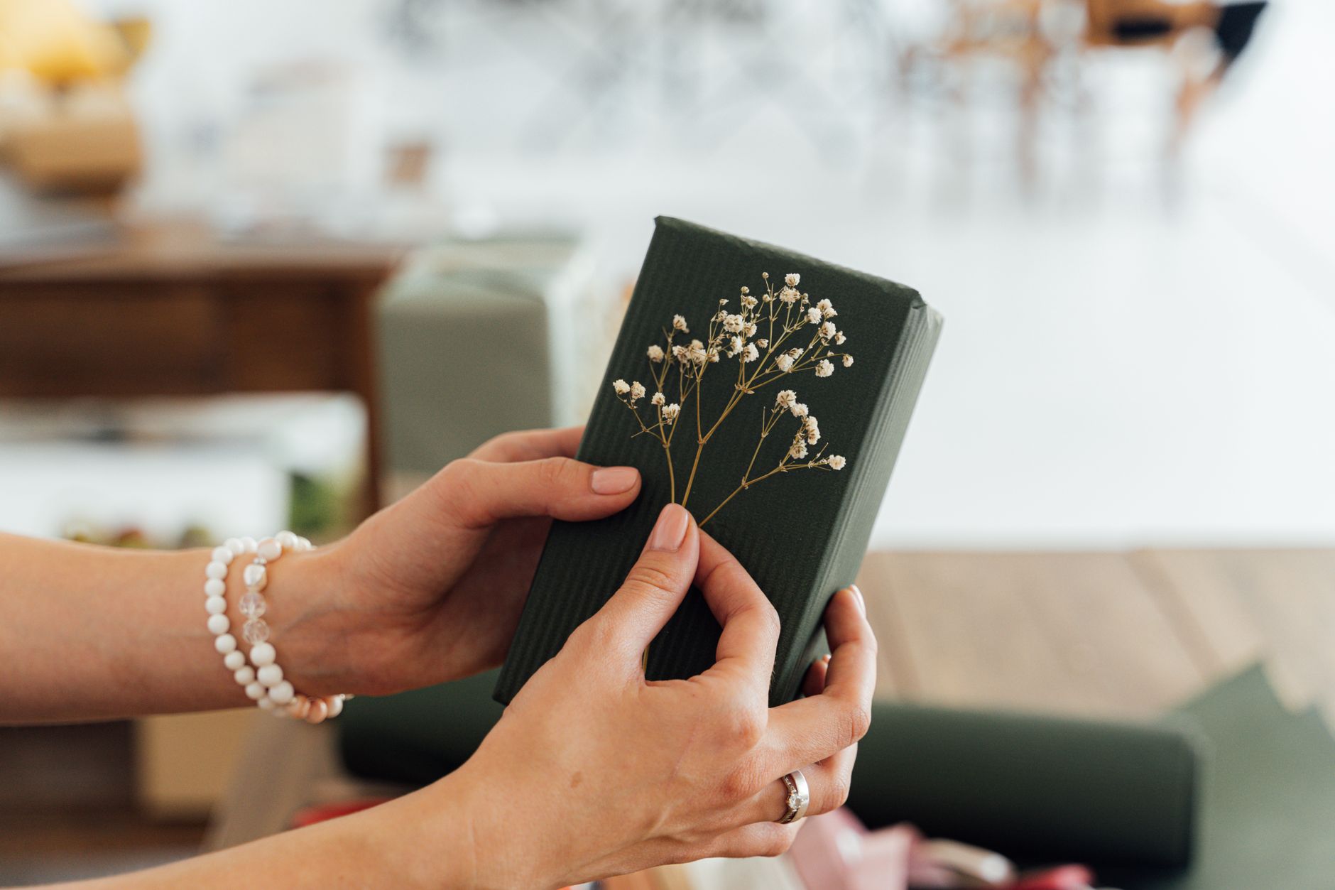 Presenting handmade gifts with flowers